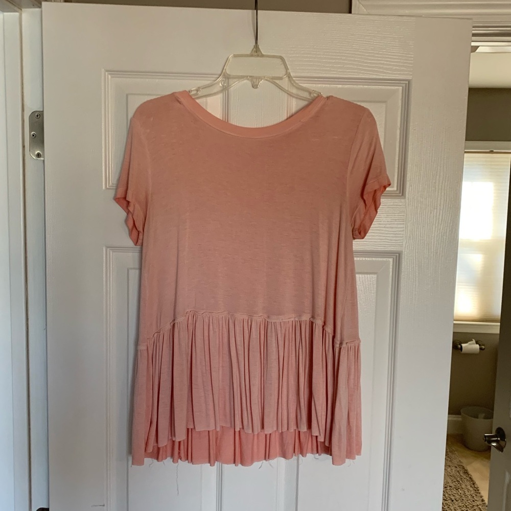 Distressed peplum top